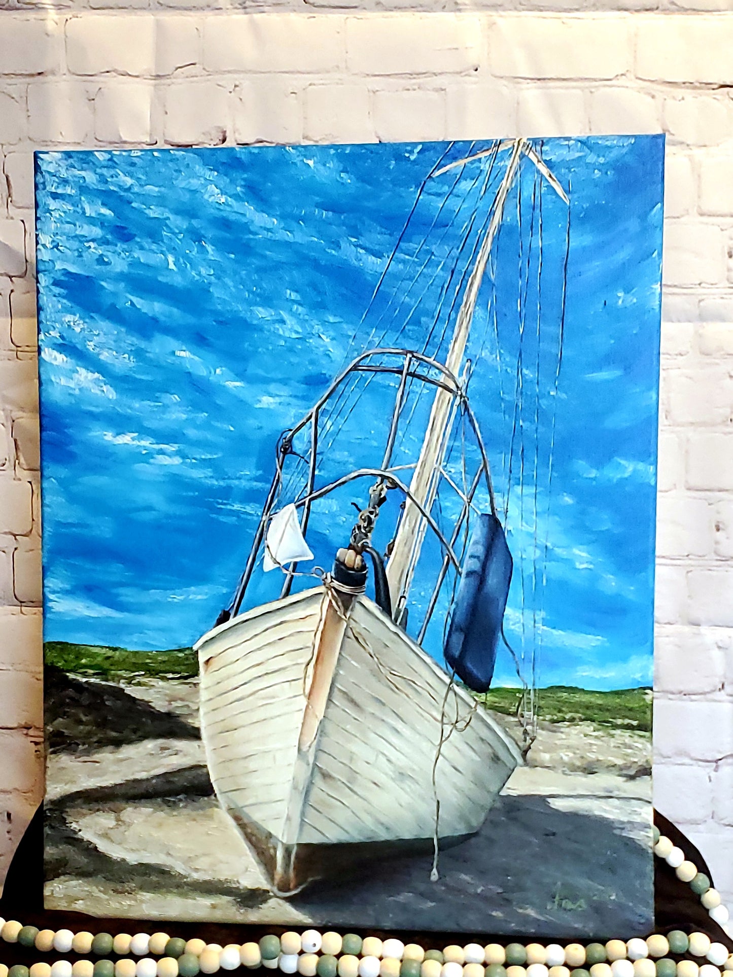 Beached sailboat oil painting