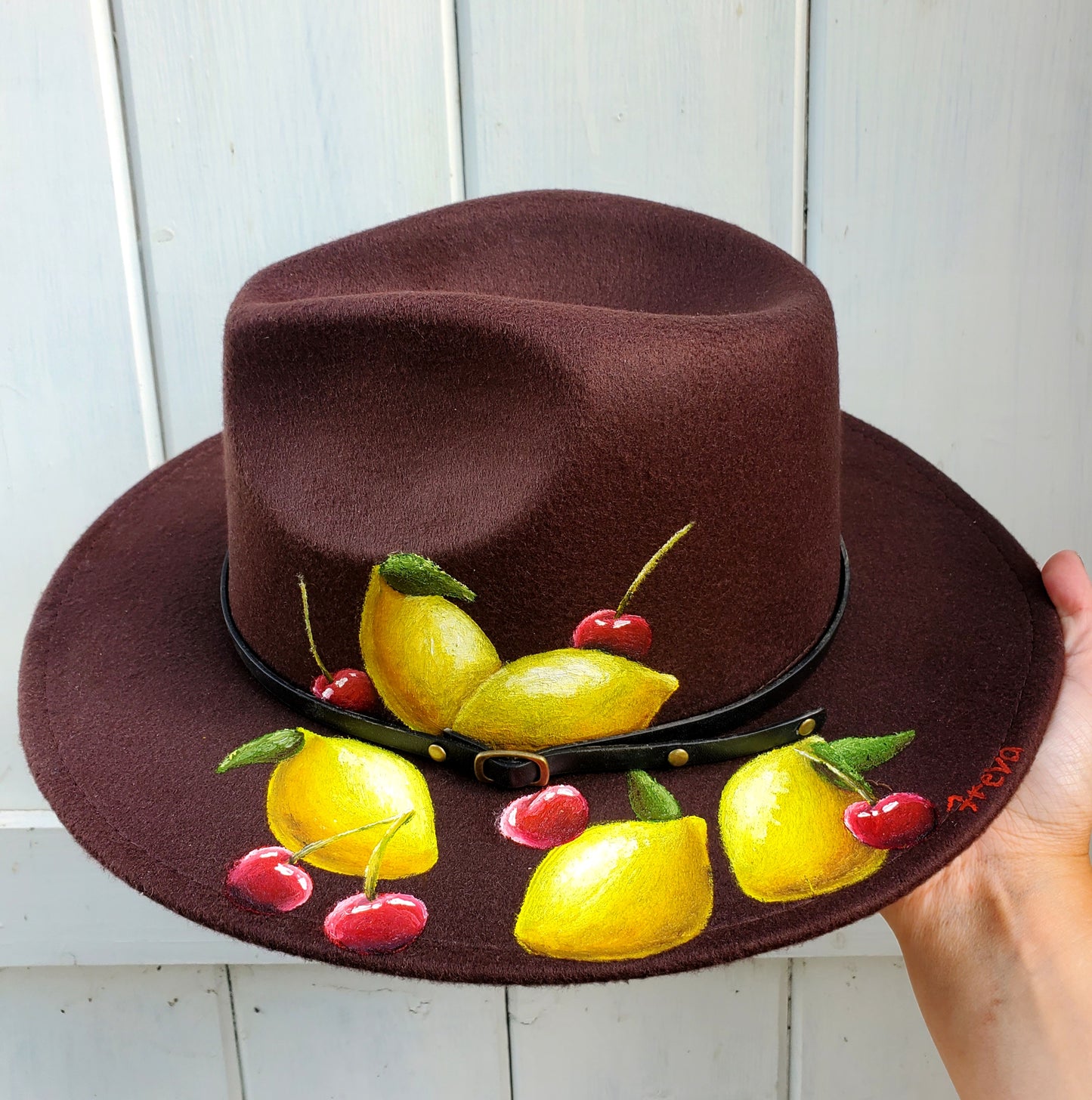 Brown lemon and cherry fedora